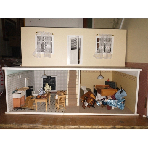 235 - A superb large Dolls House produced by THE DOLLS HOUSE EMPORIUM.  This is a substantial lot with the... 