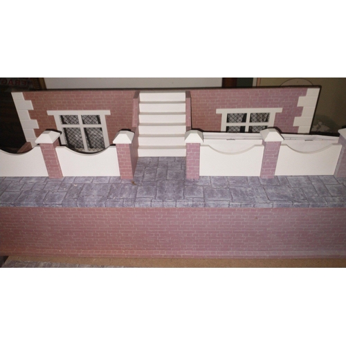 235 - A superb large Dolls House produced by THE DOLLS HOUSE EMPORIUM.  This is a substantial lot with the... 