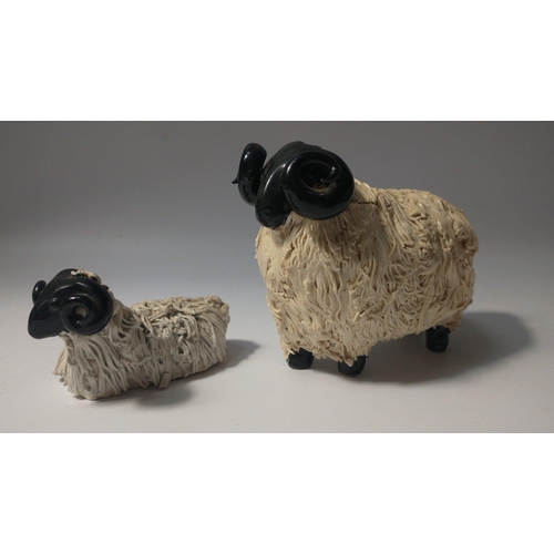 273 - Two ceramic BLACKFACE SHEEP made in Scotland , the largest stands 10cm tall#273