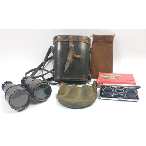 460 - A small collection of opticals to include a pair of binoculars stamped BROWN, GLASGOW in a rather wo... 