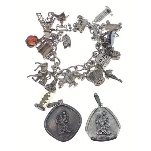 55 - First times a charm !  A lovely sterling silver charm bracelet.  Links are stamped 0.925 and charms ... 