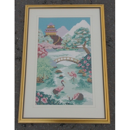 104 - An expertly hand-worked framed and glazed tapestry of a Japanese garden with Mount Fuji in the backg... 