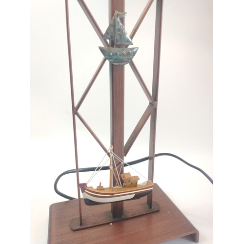 108 - A table lamp with a nautical theme with a faux wood base and stem standing approx 60cm high#108