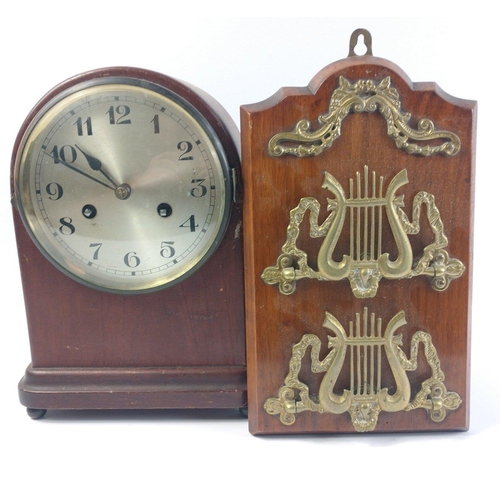 110 - A mid century wooden cased mantle clock with pendulum and a nice wooden letter rack with brass music... 