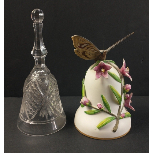 154 - Two small decorative bells a glass one and a ceramic one topped with a BUTTERFLY but sadly with some... 