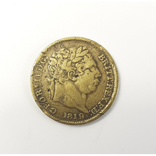 181 - 1819 George III Brass shilling gambling token in fair condition.  Overall good detail with wear to e... 