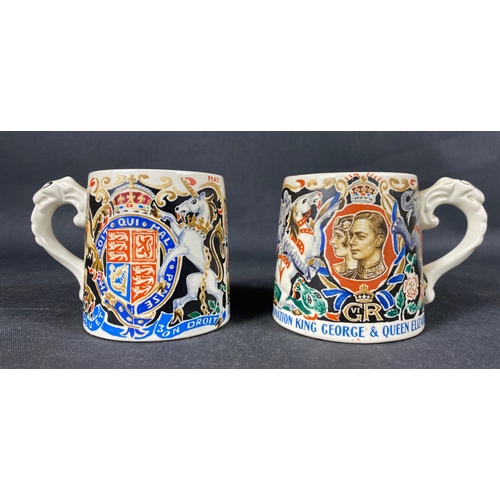 190 - A pair of 1937 King George VI and Queen Elizabeth coronation mugs designed by Dame Laura Knight each... 