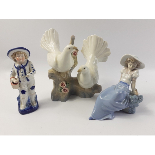 212 - A mixed decorative ceramics lot to include a really lovely NAO lady sitting with a bird, NB the bird... 