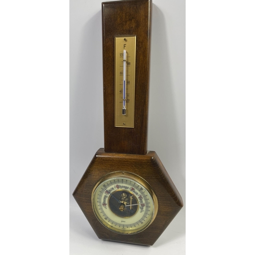 218 - A nice wee wall BAROMETER with built-in thermometer - dimensions 38cm tall x 18cm wide(at wisest poi... 