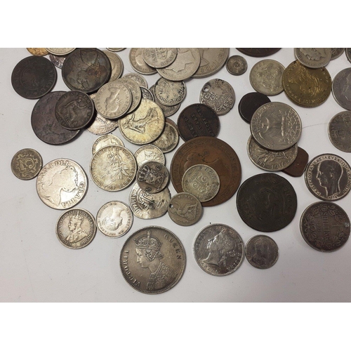 225 - A small collection of coins to include some silver including a very nice grade 1862 Queen Victoria O... 