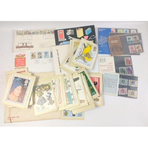 302 - A folder crammed full of STAMP SETS and POST OFFICE picture card postcards including a 1976 UNITED S... 