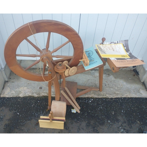 310 - A traditional wooden spinning wheel from ASHFORD HANDICRAFTS with operating instructions and a pair ... 