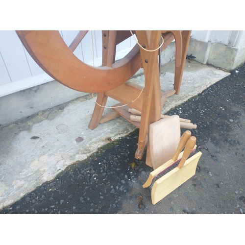 310 - A traditional wooden spinning wheel from ASHFORD HANDICRAFTS with operating instructions and a pair ... 