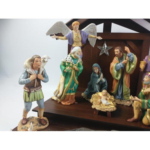 313 - Establish a new family Christmas tradition with this complete quality 14 piece Franklin Mint NATIVIT... 