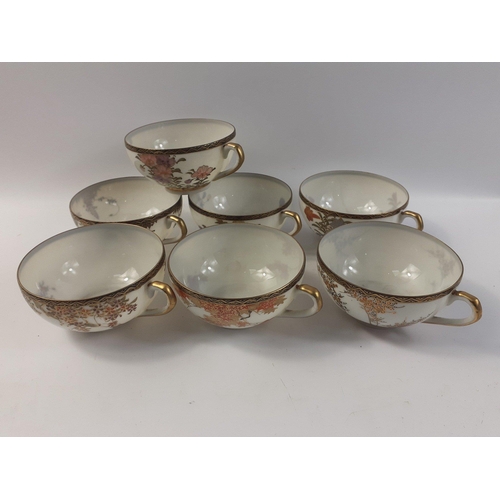 327 - Seven oriental eggshell tea bowls with attractive assorted floral patterns, each with signature to b... 