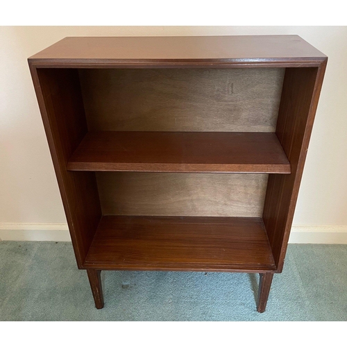 331 - A handy small two shelf retro floor bookcase supported on four tapered legs - dimensions 75cm height... 