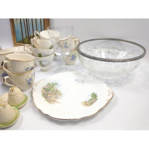 364 - A REGENCY bone china tea service to include 6 side plates, 6 saucers, 6 cups, 1 cake plate,1 milk ju... 