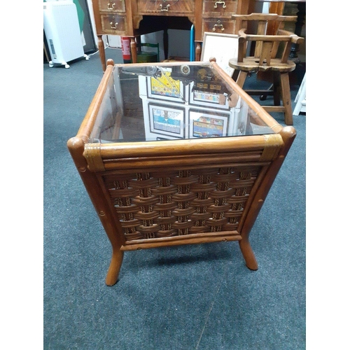 53 - A useful small bamboo and glass coffee table in good order.  Measures 80 x 50 x 50 cm approx#53