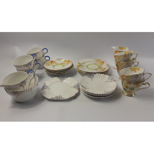 6 - Two part teasets one by STANLEY CHINA comprising four cups (one with hairline cracks to base)and sau... 