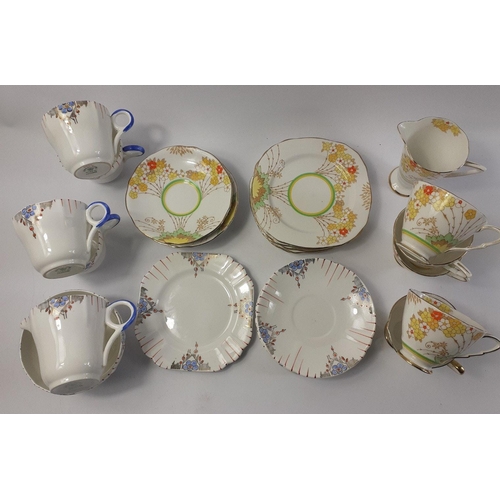 6 - Two part teasets one by STANLEY CHINA comprising four cups (one with hairline cracks to base)and sau... 