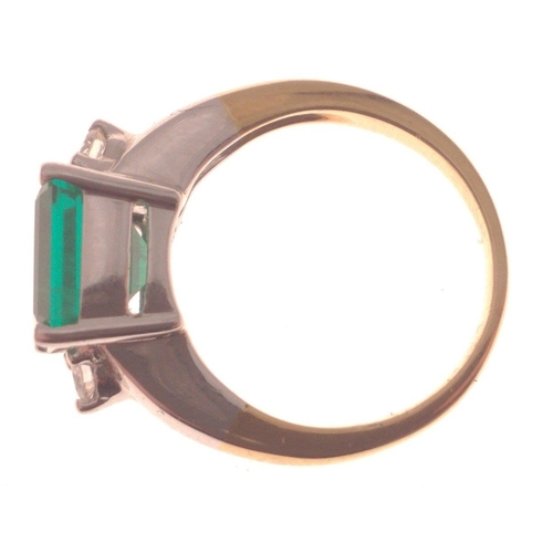 4 - LARGE COLOMBIAN EMERALD! 
18ct(750 stamped) yellow and white gold ring with a 4ct Colombian Emerald ... 