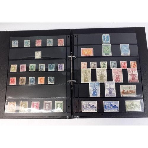 112 - SPAIN STAMP ALBUM - an album containing stock card pages with an interesting collection of early and... 