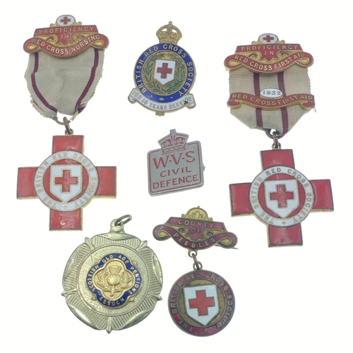 124 - A collection of RED CROSS Proficiency badges including from 1932, a WVS Civil Defence badge, a Count... 