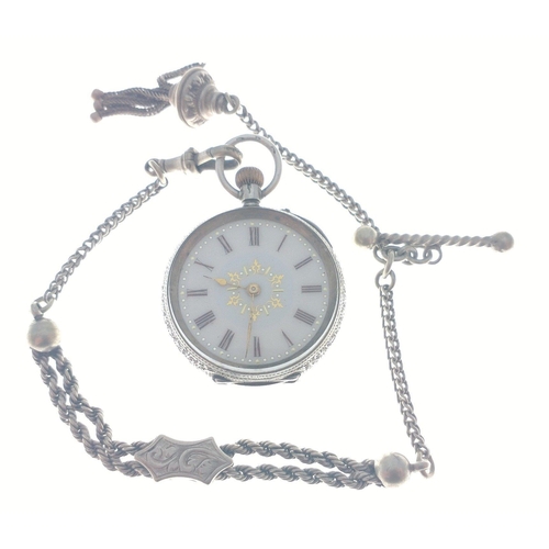 138 - Ladies silver hallmarked fob watch on chain.  The very attractive chain is marked 'real silver'.  Wa... 