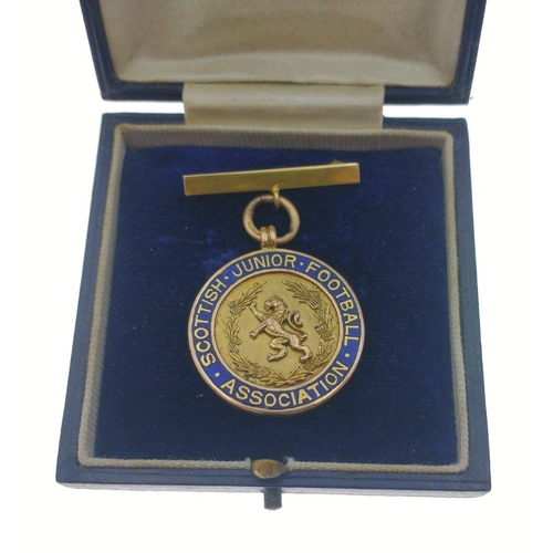 15 - SCOTTISH JUNIOR FOOTBALL ASSOCIATION 1933 - a beautiful 14ct hallmarked gold medal presented to JAME... 