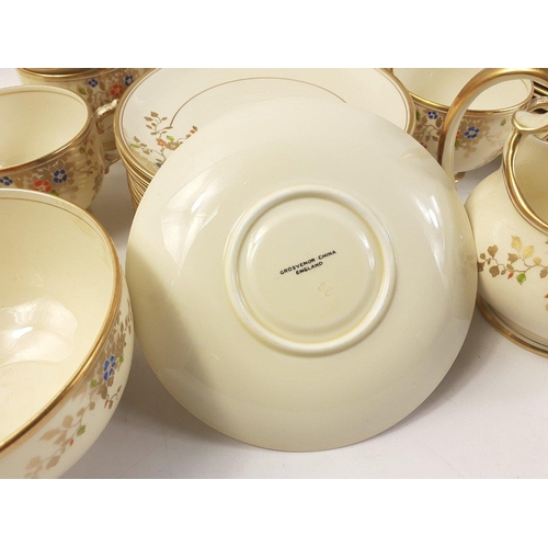 227 - GROSVENOR CHINA, part tea service in attractive cream and floral pattern finish, to include two larg... 