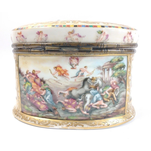 242 - A CAPODIMONTE large oval shaped porcelain box with hinged top and raised pattern with classical scen... 