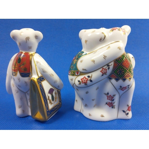 253 - Two ROYAL CROWN DERBY teddy bear paperweights, one with thistle shopping bag, no stoppers, no damage... 