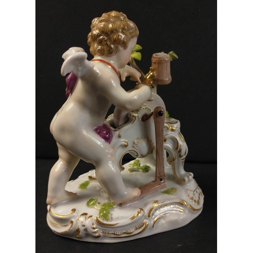 277 - A Meissen-style Cupid sharpening bow, with jar of oil balanced in a tree (damage to foliage) incised... 