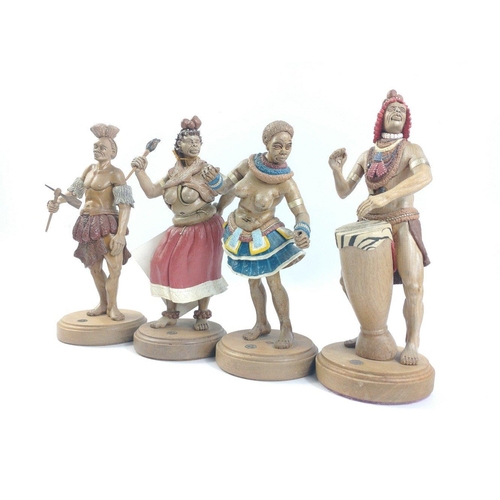 282 - A set of four carved WOODEN AFRICAN tribal dancing figures by SCHWARZ ARTWORKS , three of the figure... 