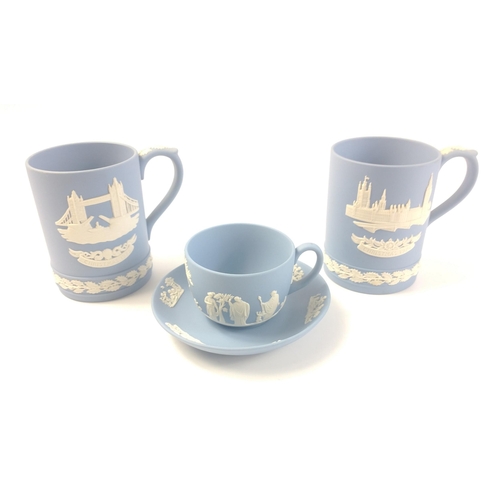 316 - Two WEDGWOOD Christmas tankards from 1974 and 1975 plus a coffee can and saucer and a tea cup and sa... 