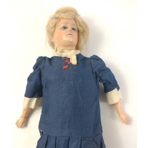 344 - A small vintage composite doll 38cm high approx with soft body and hard limbs and face.  Particularl... 