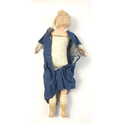 344 - A small vintage composite doll 38cm high approx with soft body and hard limbs and face.  Particularl... 