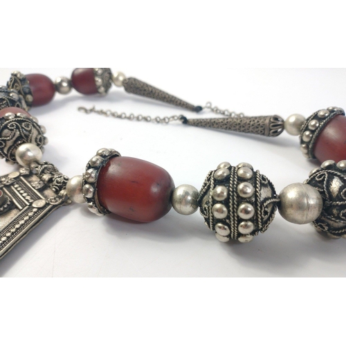 36 - Huge Middle Eastern necklace with red resin beads and white metal sculpted balls and bells.  Bought ... 