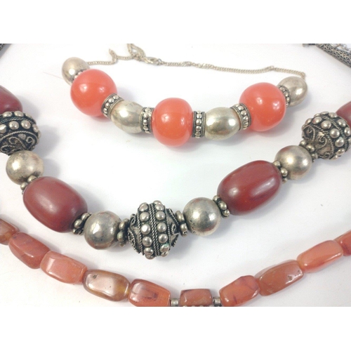 41 - A super collection of substantial traditional coral coloured Middle Eastern beaded jewellery. 4 love... 