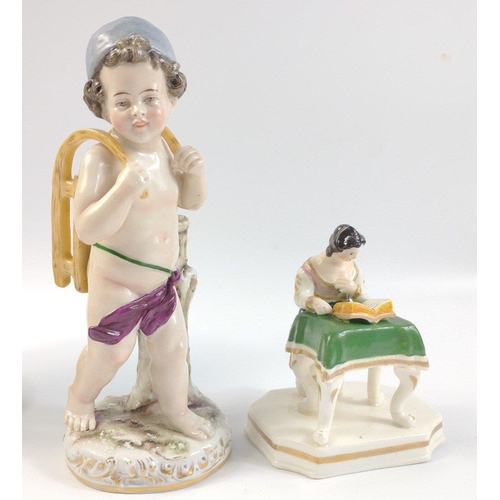 417 - A small collection of decorative ceramic and glass items to include a young boy with a sledge on his... 