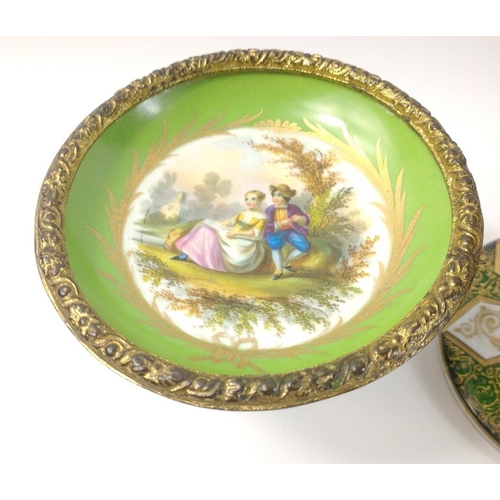 417 - A small collection of decorative ceramic and glass items to include a young boy with a sledge on his... 