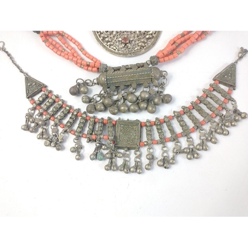 42 - Three lovely vintage Middle Eastern necklaces with coral coloured beads and white metal multi strand... 