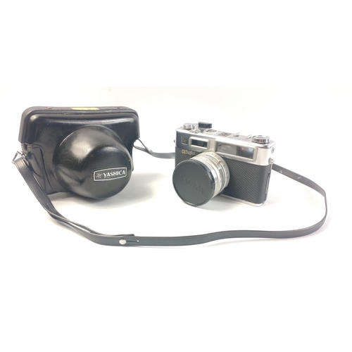 429 - A YASHICA ELECTRO 35 camera with a Yashinon-DX 1:1.7 f=4 5 mm lens, with carry case#429