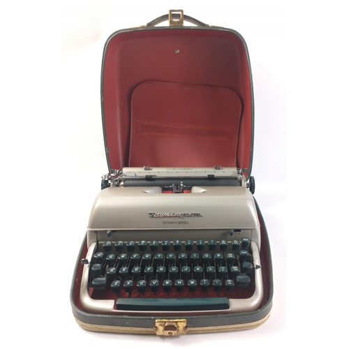 435 - Vintage REMINGTON Quiet Riter portable vintage typewriter in carry case.  Appears to be in good work... 