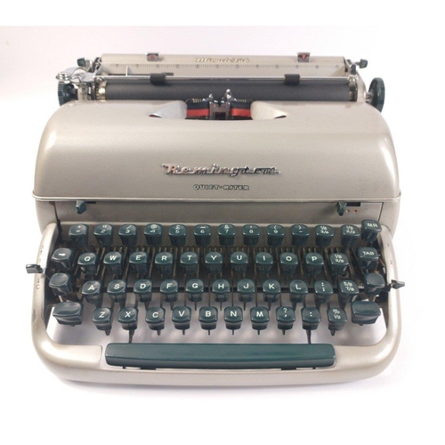 435 - Vintage REMINGTON Quiet Riter portable vintage typewriter in carry case.  Appears to be in good work... 