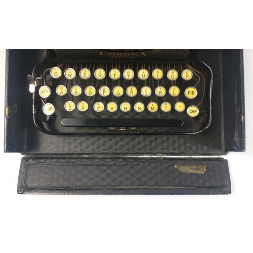 437 - An L C SMITH & CORONA 'CORONA SPECIAL' portable folding typewriter in nice condition, case measu... 