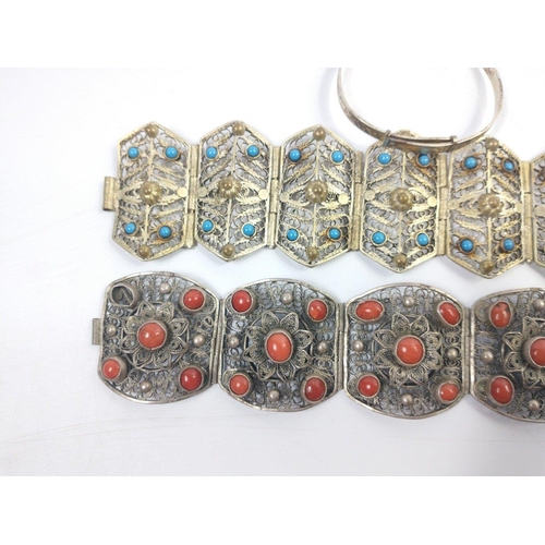 49 - Two white metal filigree bracelets, one with coral coloured stones, the other with turquoise coloure... 