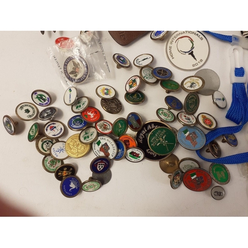 502 - Interesting little collection of golfing ball markers, and event lanyards to include numerous ball m... 