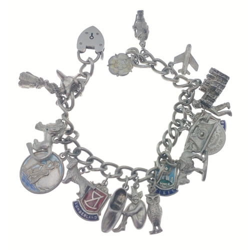 70 - VINTAGE - A SILVER stamped UNUSUAL charm bracelet with a heart shaped padlock - combined weight 52.3... 