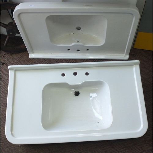 710 - UNUSED ITEMS! Two SUBSTANTIAL HIS AND HERS moulded porcelain sinks, unused, each measuring approx 10... 